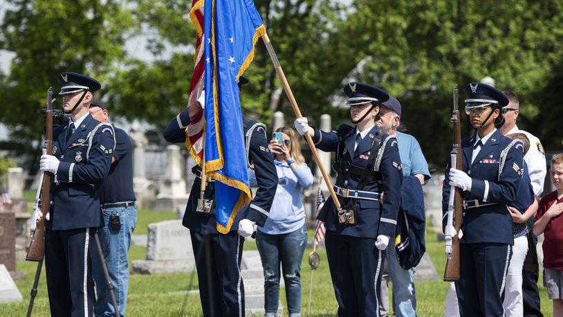 Honor Guard members from Wright-Patterson Air Force Base, Ohio, present the colors during a Memorial Day ceremony in Fairborn, Ohio, May 31, 2021. Established in 1971, Memorial Day is an official federal holiday meant to allow people to honor the men and women who have died while on duty with the U.S. Military. (U.S. Air Force photo by Wesley Farnsworth)