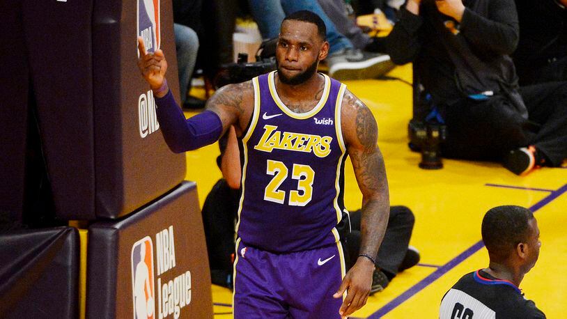 LOS ANGELES, CALIFORNIA - MARCH 06: LeBron James #23 of the Los Angeles Lakers celebrates after passing Michael Jordan and moving to #4 on the NBA's all-time scoring list during the second quarter against the Denver Nuggets at Staples Center on March 06, 2019 in Los Angeles, California. (Photo by Robert Laberge/Getty Images)