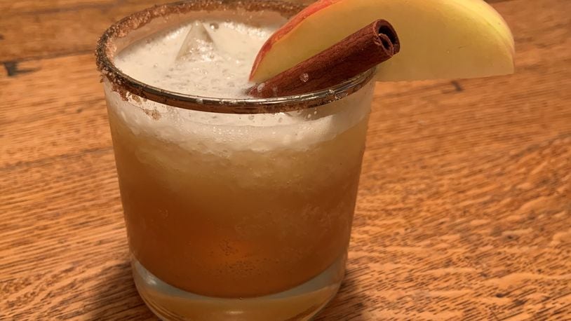 Bourbon or spiced dark rum, lemon juice, honey simple syrup and hard apple cider combine for the perfect fall brew. CONTRIBUTED