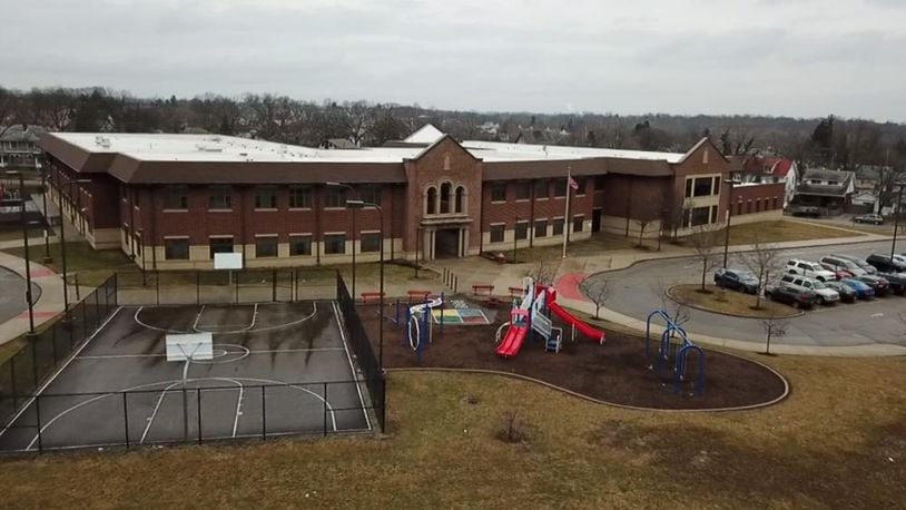 A 14-year-old was found with a gun at Edwin Joel Brown Middle School in Dayton on Wednesday, causing students to hit the floor. CHUCK HAMLIN / STAFF