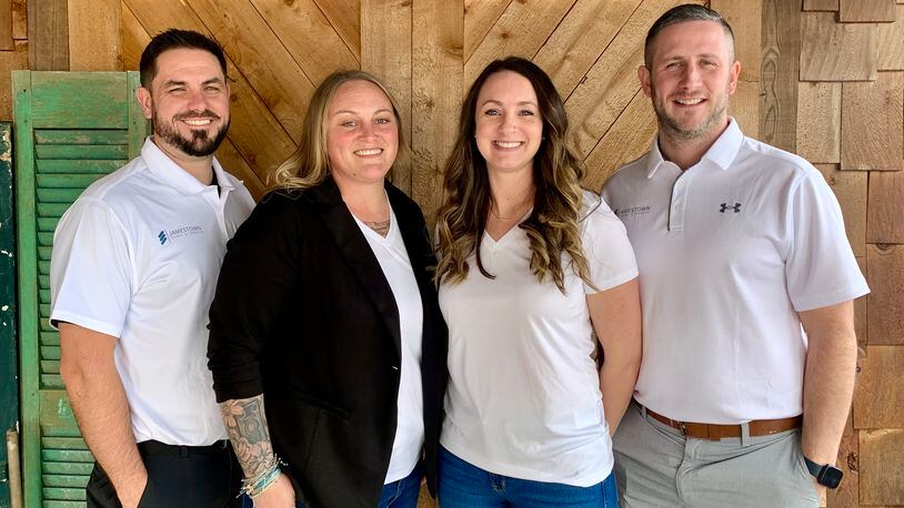 From left: Chase Trotter, Amber Trotter, Adrienne Linville and Luke Linville, founders of Main Street Jamestown, are working to help small businesses in the Greene County village after taking over the Jamestown Chamber of Commerce. LONDON BISHOP/STAFF