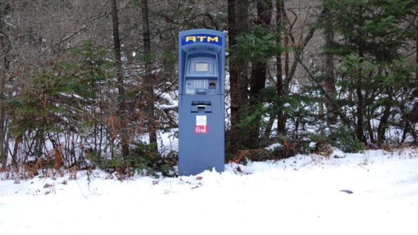 An Atm found in the snowy woods of southern Maine was put there as a joke, authorities said.