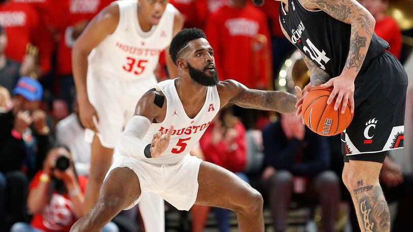 HOUSTON, TEXAS - FEBRUARY 10: Corey Davis Jr. #5 of the Houston Cougars faces up Jarron Cumberland #34 of the Cincinnati Bearcats during the second half at Fertitta Center on February 10, 2019 in Houston, Texas. (Photo by Bob Levey/Getty Images)