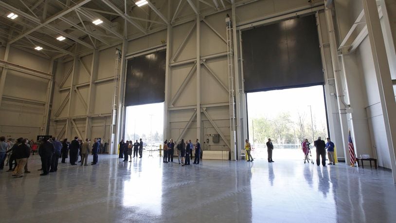The National Air and Space Intelligence Center held a ribbon-cutting ceremony for the then-new Haynes Hall facility on Wright-Patterson Air Force Base in this 2017 file photo. The $29.5 million, 58,000 square-foot building resembles a large airplane hangar and will be used for foreign materiel exploitation, NASIC said at the time. TY GREENLEES / STAFF