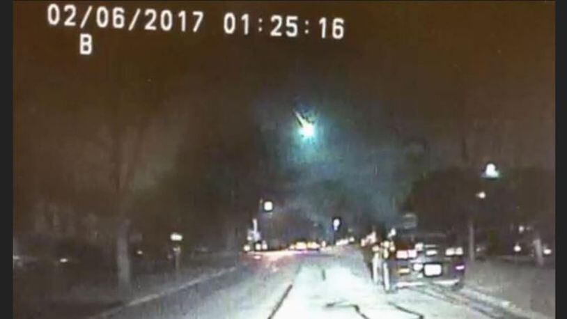 Image from a dashcam video provided by Lisle Police Department in Lisle, Ill., shows a meteor as it streaked over Lake Michigan Feb. 6, 2017. The meteor lit up the sky across several states in the Midwest.  Contributed photo