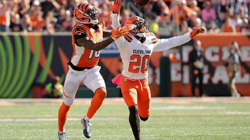Bengals wide receiver A.J. Green makes a one handed catch while being defended by Briean Boddy-Calhoun (#20) of the  Browns during an Oct. 23, 2106 game at Paul Brown Stadium. Green goes a long way toward making wide receiver one of the deepest positions on Cincinnati's roster.