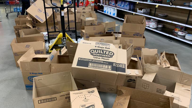 Panicked buyers wiped out toilet paper and paper towel stock on shelves of common products as the coronavirus spread across the country. WAYNE BAKER/STAFF