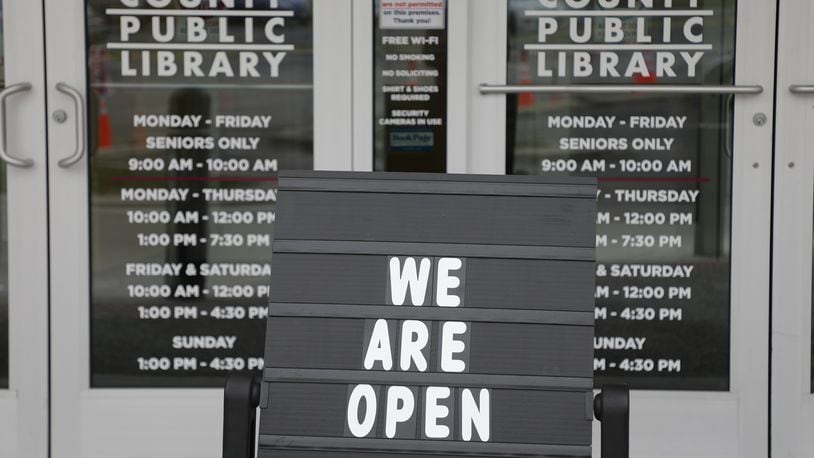 The Clark County Library is open for in-person services. BILL LACKEY/STAFF