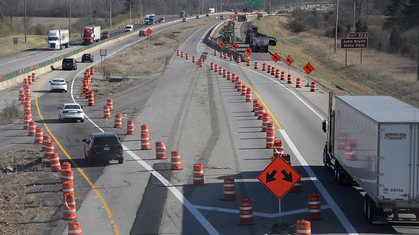 Interstate 70 eastbound traffic now splits to two separate lanes through the Clark County widening project. Federal funds paid for part of the $43 million project.  BILL LACKEY/STAFF
