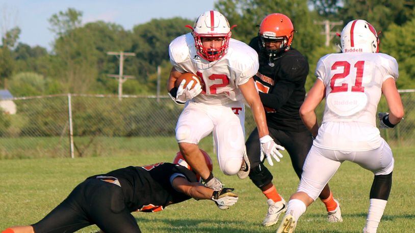 Triad running back Dylan Rice during a recent scrimmage. Greg Billing/CONTRIBUTED
