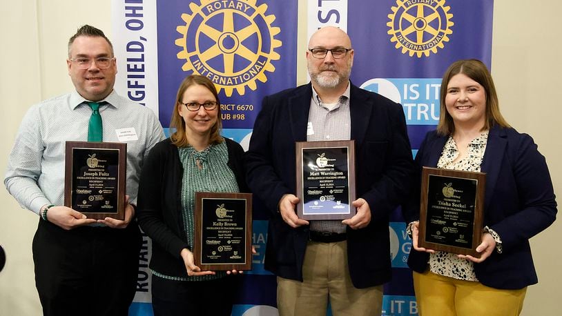 The Excellence in Teaching Award winners, from left, Joseph Fultz, Kelly Brown, Matt Warrington and Trisha Seckel Monday, April 15, 2024 during the 35th Annual Excellence in Teaching Awards Program & Luncheon at the Hollenbeck Bayley Conference Center. BILL LACKEY/STAFF