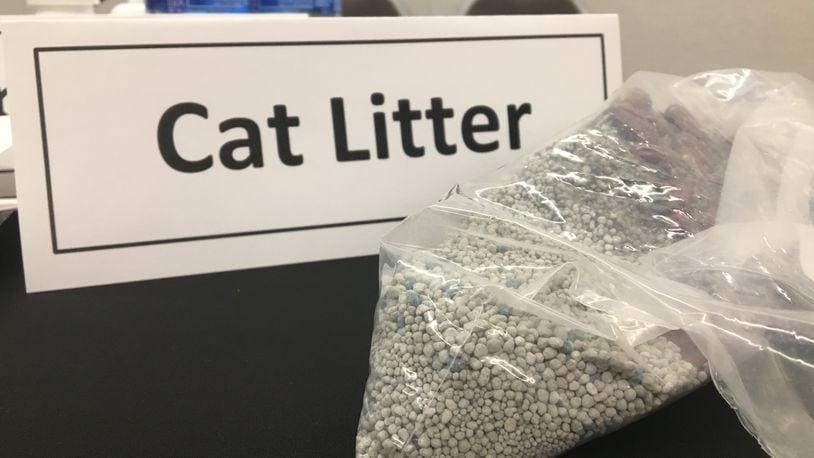 Cat litter can be used to dispose of unwanted or unused prescription pills safely, according to the Ohio Pharmacists Association. Pour water into a plastic, sealable bag with the litter and the pills, mix them up and then dispose in the trash. KATIE WEDELL/STAFF