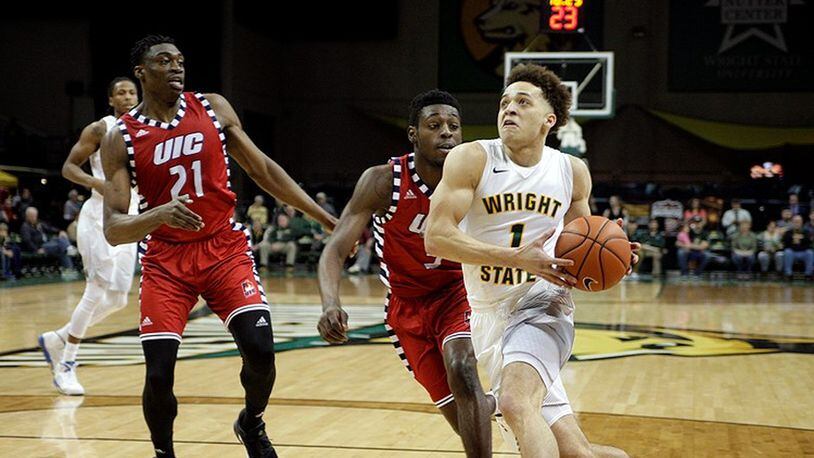 Wright State’s Justin Mitchell drives against Illinois-Chicago at the Nutter Center on Feb. 26, 2017. TIM ZECHAR/CONTRIBUTED