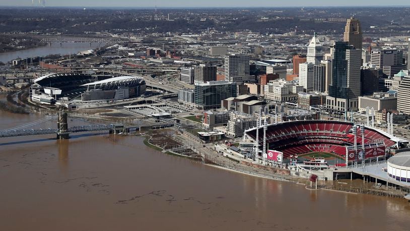 This Monday, Feb. 26, 2018, photo shows floodwater from the Ohio River flowing into downtown Cincinnati. The National Weather Service says the Ohio River crested Sunday and was still well above flood stage Monday. (Kareem Elgazzar/The Cincinnati Enquirer via AP)