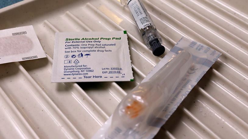 A flu shot ready to be administered. Bill Lackey/Staff