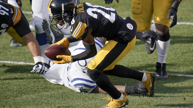 Pittsburgh Steelers cornerback Mike Hilton (28) recovers a fumble in front of Indianapolis Colts offensive tackle Chaz Green (75) during the first half of an NFL football game, Sunday, Dec. 27, 2020, in Pittsburgh. (AP Photo/Gene J. Puskar)
