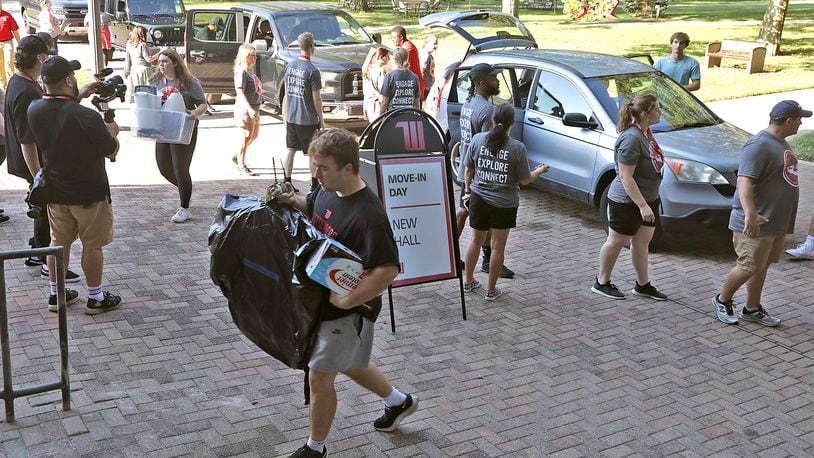 Wittenberg University students and faculty help new students move into their dorms Thursday, August 25, 2022 during Move-In Day on campus. Wittenberg's fall semester starts Monday, August 29. BILL LACKEY/STAFF
