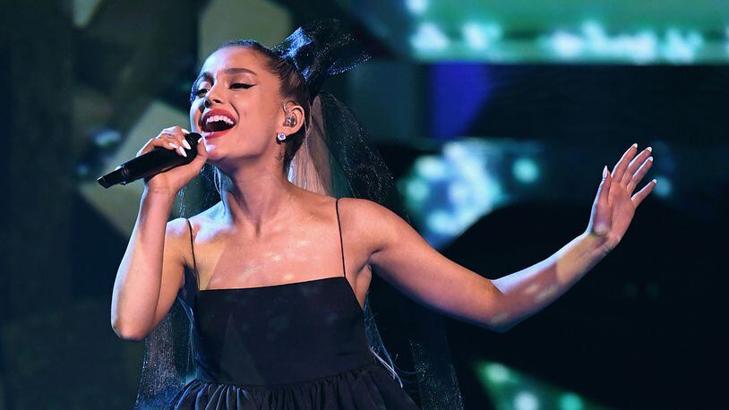 Singer Ariana Grande wore her hair down and little makeup on the July cover of British Vogue.  (Photo by Kevin Winter/Getty Images)