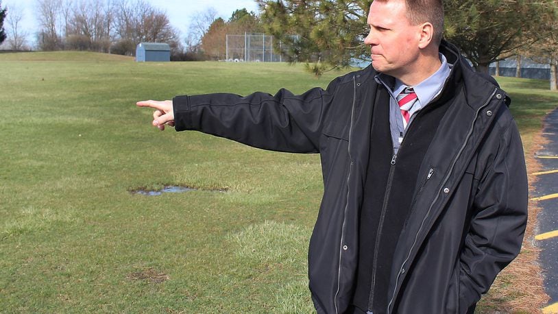 Earlier this year, Southeastern Local School superintendent, David Shea showed where the district hopes to build a new multi-purpose gymnasium near Miami View Elementary school. JEFF GUERINI/STAFF