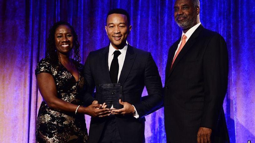 NAACP LDF president and director-counsel Sherrilyn Ifill, musician John Legend and LDF board chair Gerald Adolph on stage during the the LDF 31th National Equal Justice Awards Dinner at Cipriani 42nd Street on November 2, 2017 in New York City. (Photo by Dave Kotinsky/Getty Images for NAACP Legal Defense and Educational Fund, Inc.)