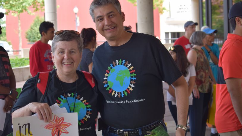 Caption: Longtime Global Education and Peace Network member Dr. Kayvon Nezhad, seen here with Nancy Flinchbaugh during the 2018 Peace Walk, will lead a program on the Baha'i faith and how it is dealing with current issues during a virtual presentation on Thursday. Courtesy photo