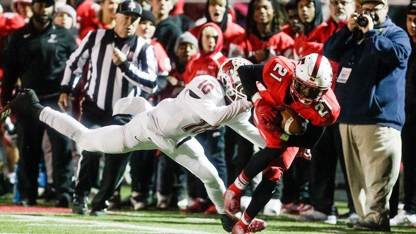 Fairfield’s Dashaun Simpkins is taken down by Colerain’s Sean Williamson during their football game Friday, Nov. 1, 2019 at Fairfield Stadium. Colerain put an end to Fairfield’s undefeated season with a 16-10 overtime win. Fairfield ended the regular season 9-1. NICK GRAHAM/STAFF