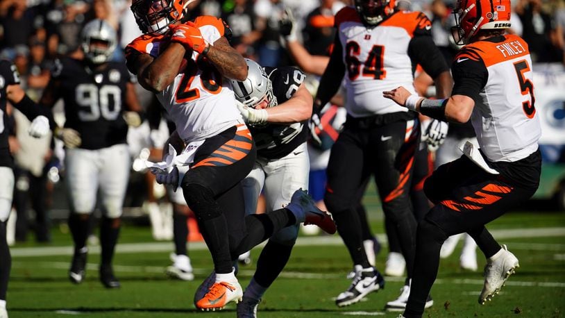 OAKLAND, CALIFORNIA - NOVEMBER 17: Joe Mixon #28 of the Cincinnati Bengals rushes for a touchdown during the first half against the Oakland Raiders at RingCentral Coliseum on November 17, 2019 in Oakland, California. (Photo by Daniel Shirey/Getty Images)