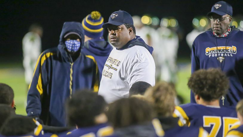 Cutline1: Springfield High School defensive coordinator Conley Smoot speaks with the team after the Wildcats beat Northmont 42-7 on Friday, Oct. 29, 2021. Michael Cooper/CONTRIBUTED
