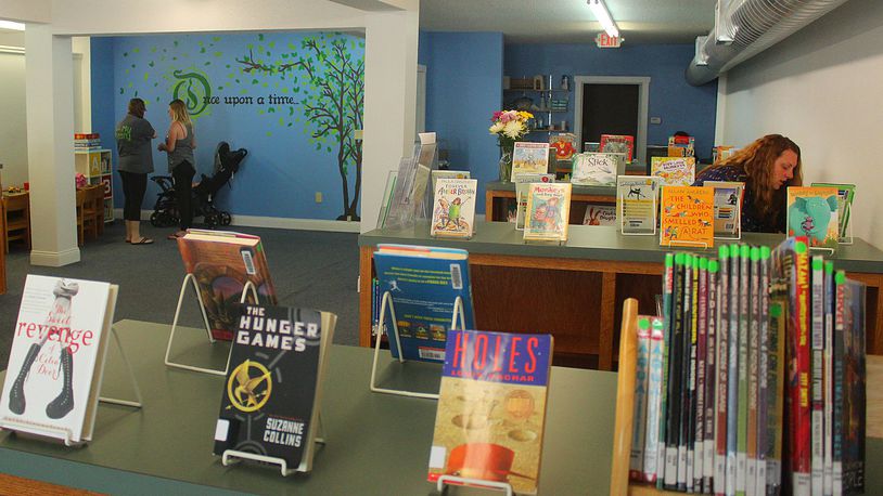 The St. Paris Public Library has opened a outreach location in the Village of Christiansburg. JEFF GUERINI/STAFF