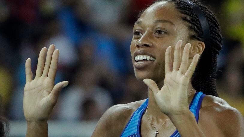 United States' Allyson Felix smiles after winning the gold in the women's 4x100-meter final during the athletics competitions of the 2016 Summer Olympics at the Olympic stadium in Rio de Janeiro, Brazil, Friday, Aug. 19, 2016. (AP Photo/Matt Dunham)