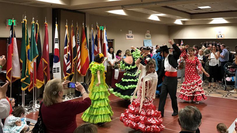 Colorfully dressed in costumes, performers gathered at a past international fair of the Wright-Patterson International Spouses Group. CONTRIBUTED