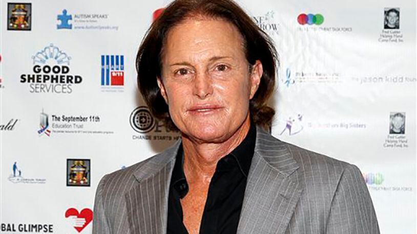 FILE - In this Sept. 11, 2013 file photo, former Olympic athlete Bruce Jenner arrives at the Annual Charity Day hosted by Cantor Fitzgerald and BGC Partners, in New York. ABC 's Diane Sawyer will interview the former Olympic champion and patriarch of the Kardashian television clan in a two-hour interview airing on Friday, April 24. (Photo by Mark Von Holden/Invision/AP, File)