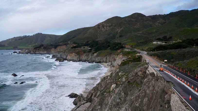 The collapsed section of the southbound lane of Highway 1 at Rocky Creek Bridge is marked off by cones Thursday, April 4, 2024, in Big Sur, Calif. The break has caused the closure of the scenic road. (AP Photo/Godofredo A. Vásquez)
