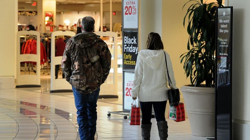 Shoppers looking for good deals at the Dayton Mall Monday, Nov. 22, 2021. MARSHALL GORBY\STAFF