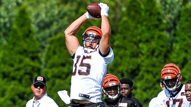 Tight end Tyler Eifert catches a pass during the first day of Cincinnati Bengals Training Camp Friday, July 28 at the practice fields beside Paul Brown Stadium in Cincinnati. NICK GRAHAM/STAFF