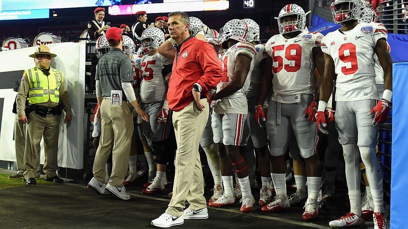 GLENDALE, AZ - DECEMBER 31: Head coach Urban Meyer of the Ohio State Buckeyes takes the field during the second half against the Clemson Tigers during the 2016 PlayStation Fiesta Bowl at University of Phoenix Stadium on December 31, 2016 in Glendale, Arizona. (Photo by Norm Hall/Getty Images)