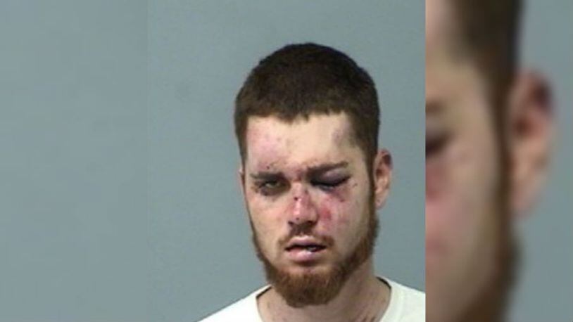 Sean Martin, 23, is accused of battering an 18- and 21-year-old after showing up to their party uninvited. (St. Johns County Sheriff's Office)