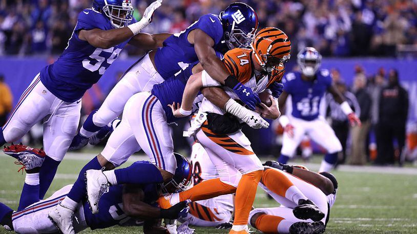 EAST RUTHERFORD, NJ - NOVEMBER 14: Jonathan Casillas #52 of the New York Giants sacks Andy Dalton #14 of the Cincinnati Bengals during the fourth quarter of the game at MetLife Stadium on November 14, 2016 in East Rutherford, New Jersey. (Photo by Al Bello/Getty Images)
