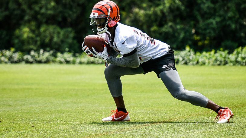 Bengals’ wide receiver John Ross practices punt returns during organized team activities Tuesday, May 22 at the practice facility near Paul Brown Stadium in Cincinnati. NICK GRAHAM/STAFF