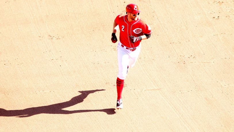 The Reds’ Zack Cozart rounds the bases after a home run against the Giants on Sunday, May 7, 2017, at Great American Ball Park in Cincinnati. David Jablonski/Staff