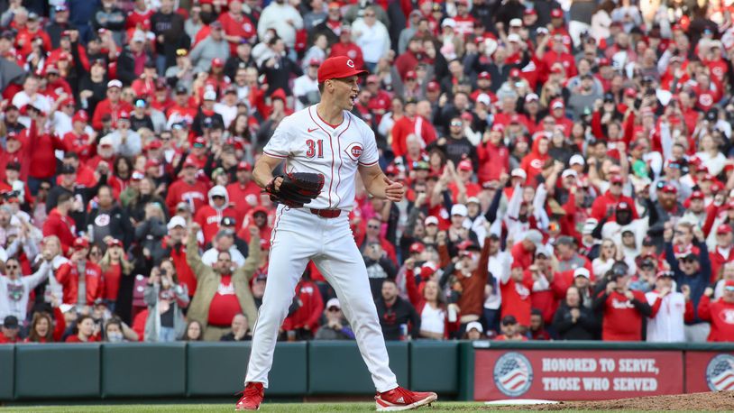 Reds reliever Brent Suter reacts after getting the final out of a victory against the Nationals on Opening Day on Thursday, March 28, 2024, at Great American Ball Park in Cincinnati. David Jablonski/Staff