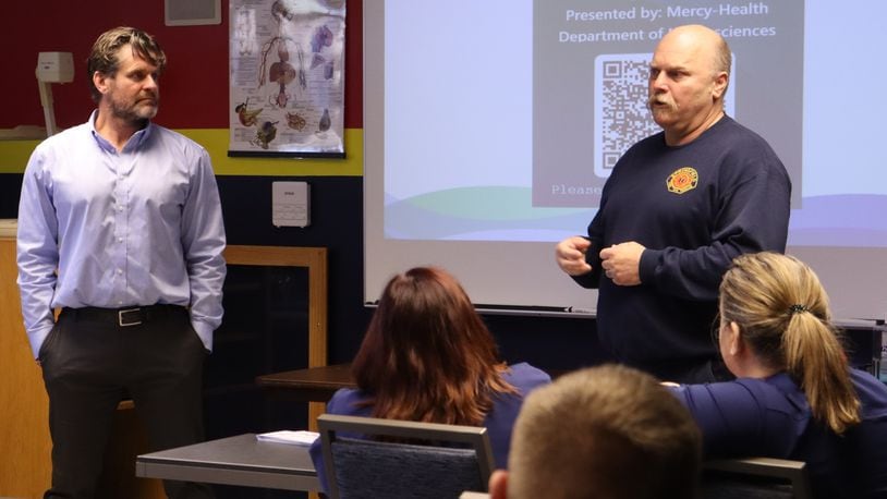 EMS Officer Felix Stranahan and Dr. Jody Short spoke about stroke intervention at a training event at the Springfield Fire Rescue Division Station 1 on Wednesday, May 10, 2023. JESSICA OROZCO/STAFF