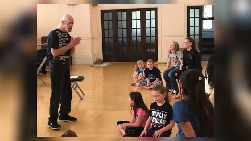 Ohio Performing Arts Institute artistic director D. Scot Davidge instructs a group of his students during a rehearsal for one of the organization’s shows in spring 2017. OPAI will have an open house to sign up for classes and information about upcoming programs. CONTRIBUTED