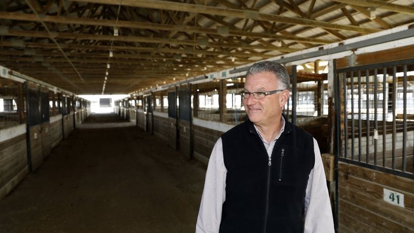 Dean Blair, director of the Clark County Fair, looks over the inside of one of the horse barns at the Clark County Fairgrounds in November of 2016. Bill Lackey/Staff