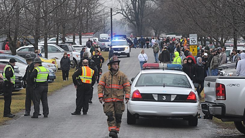 Parents waited at Lions Park in West Liberty to pick up the children after a shooting at West Liberty-Salem Schools in Champaign County. Marshall Gorby/Staff