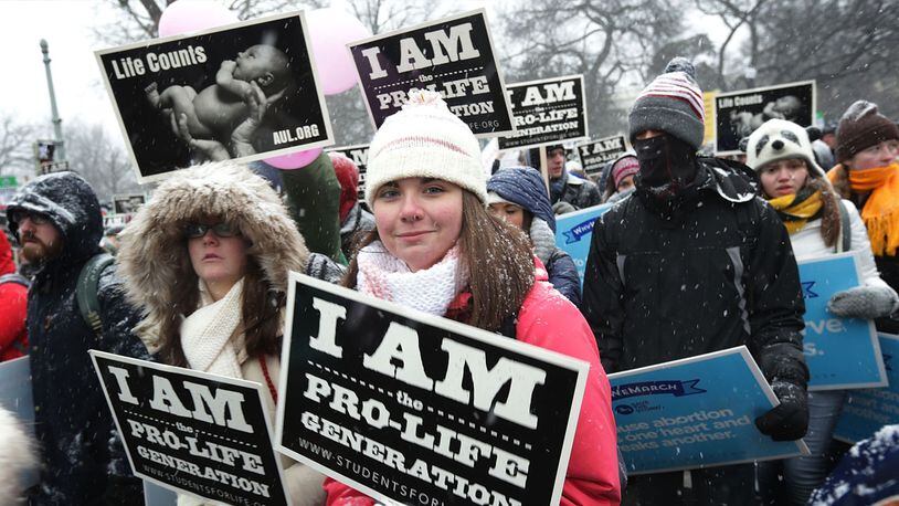 Activists participate in the 2016 March for Life January 22, 2016 in Washington, DC. The annual event marked the anniversary of the Supreme Court Roe v. Wade ruling in 1973. (Photo by Alex Wong/Getty Images)