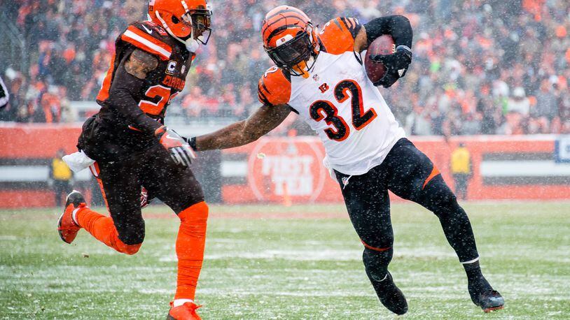 CLEVELAND, OH - DECEMBER 11: Running back Jeremy Hill #32 of the Cincinnati Bengals rushes against cornerback Joe Haden #23 of the Cleveland Browns during the first half at FirstEnergy Stadium on December 11, 2016 in Cleveland, Ohio. (Photo by Jason Miller/Getty Images)