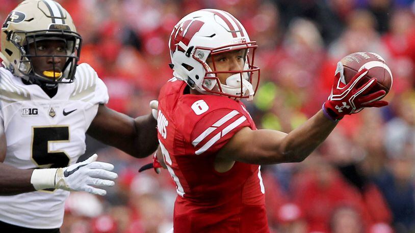 Danny Davis III of the Wisconsin Badgers attempts to make a catch while being guarded by T.J. Jallow of the Purdue Boilermakers in the second quarter at Camp Randall Stadium on October 14, 2017 in Madison, Wisconsin. (Photo by Dylan Buell/Getty Images)