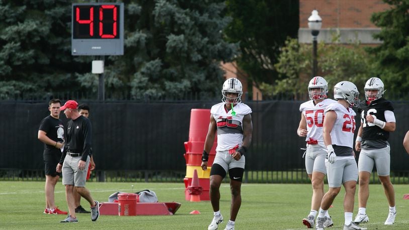 Alter grad C.J. Hicks, center, works at the first Ohio State practice of the season on Thursday, Aug. 4, 2022, at the Woody Hayes Athletic Center in Columbus. David Jablonski/Staff