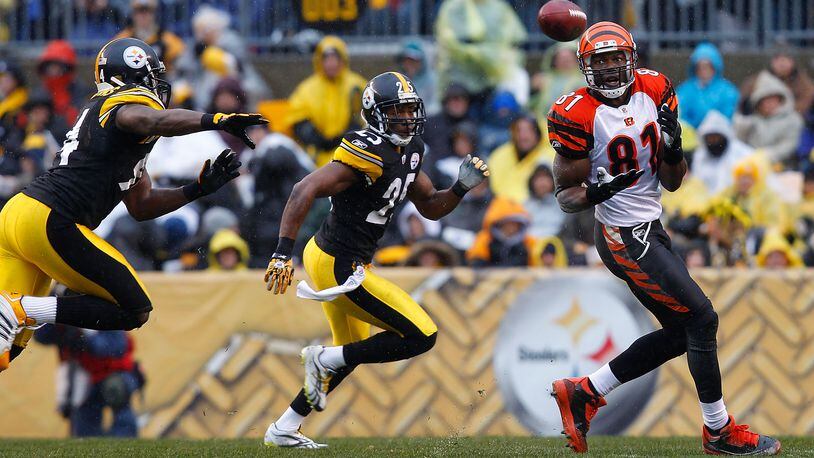 Former Bengals wide receiver Terell Owens catches a pass in front of Steelers defensive back Ryan Clark during a game on December 12, 2010 at Heinz Field in Pittsburgh. Owens once played in the Hall of Fame game for Cincinnati.